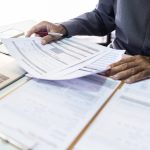 Person working on home remodeling permits in Lafayette, Indiana