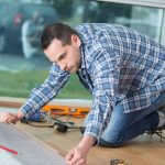 Expert replacing the flooring