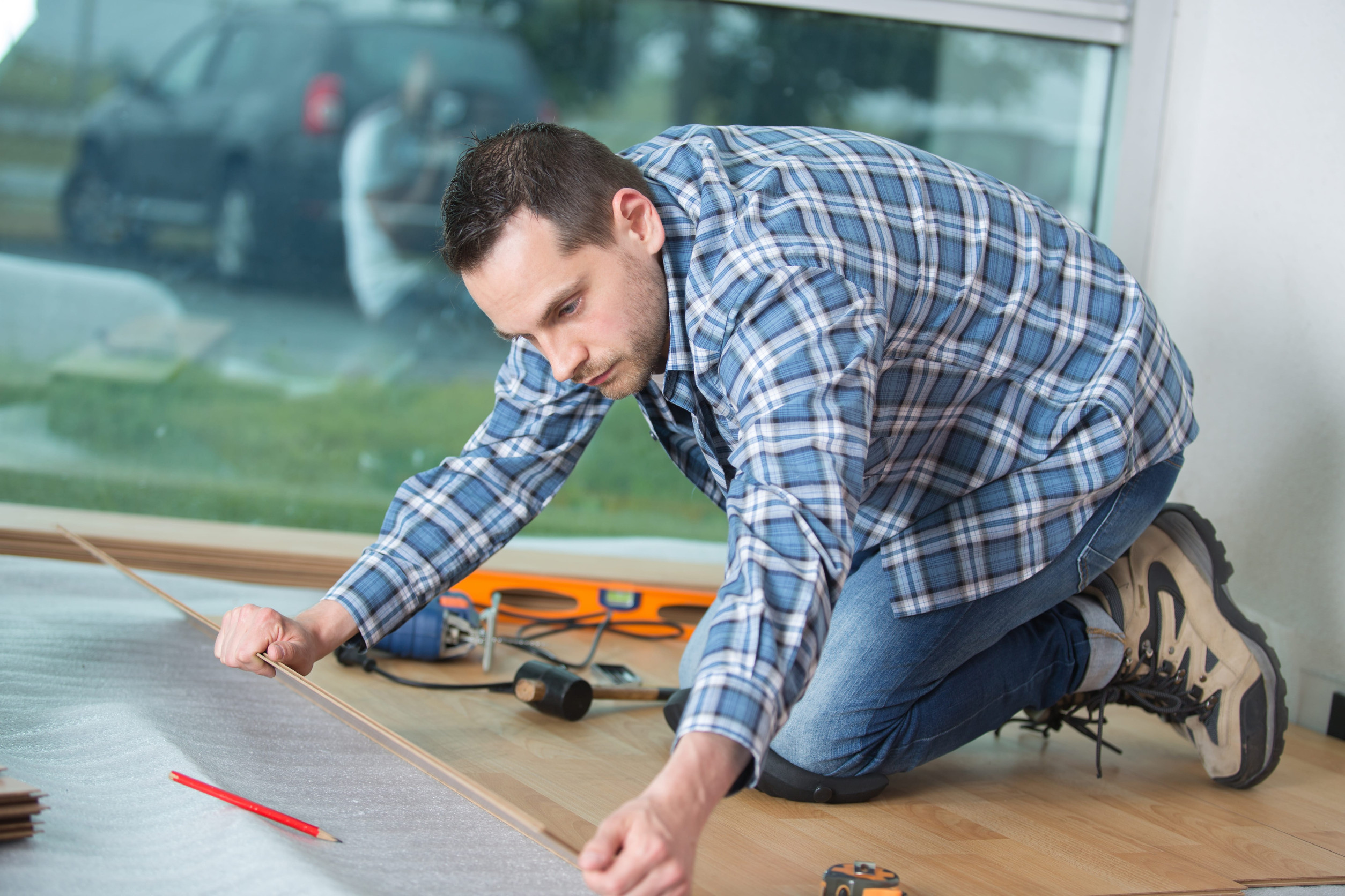 Expert replacing the flooring